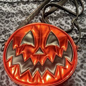 Love pain stiches metallic red pumpkin bag
